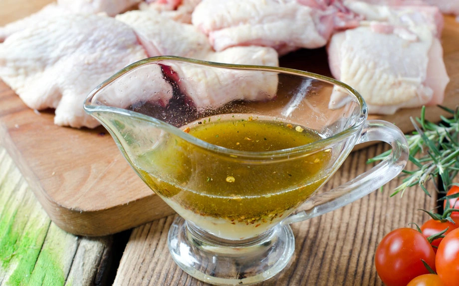 Raw chicken pieces marinated with yogurt and spices